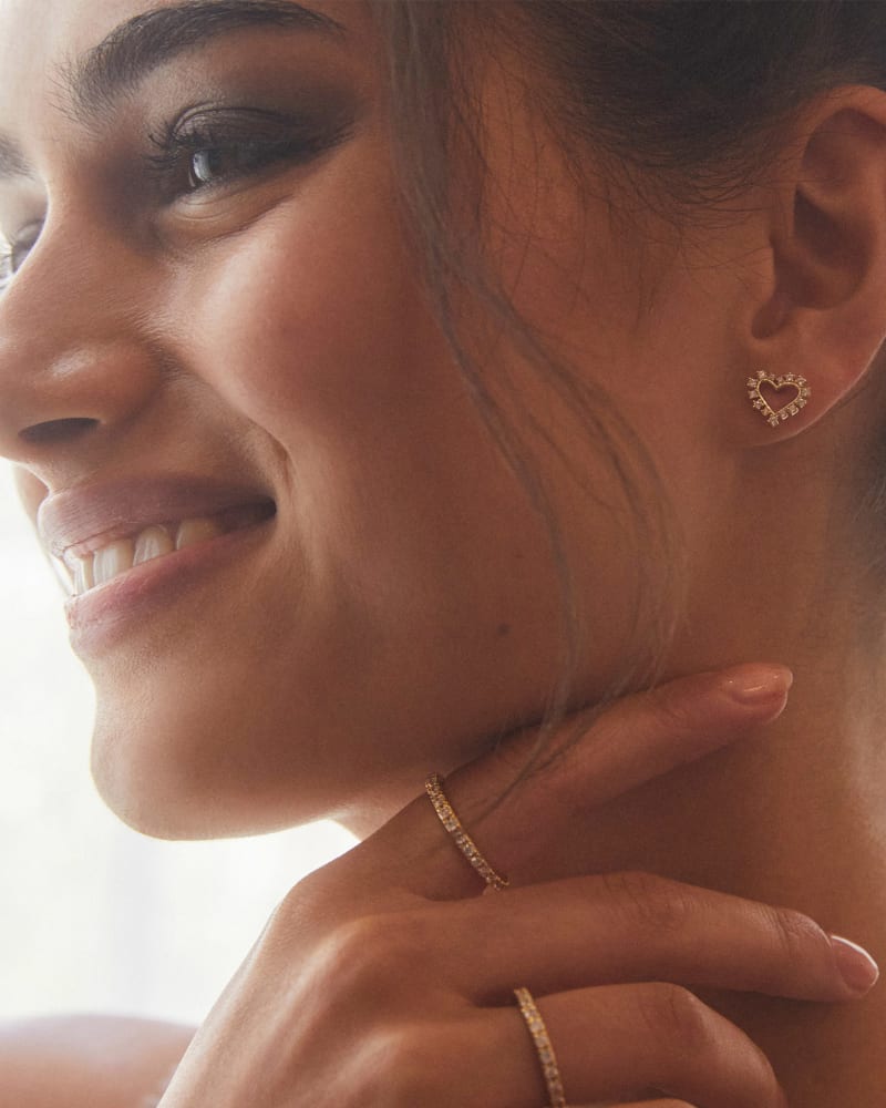 Ari Heart Gold Stud Earrings in White Crystal image number 1